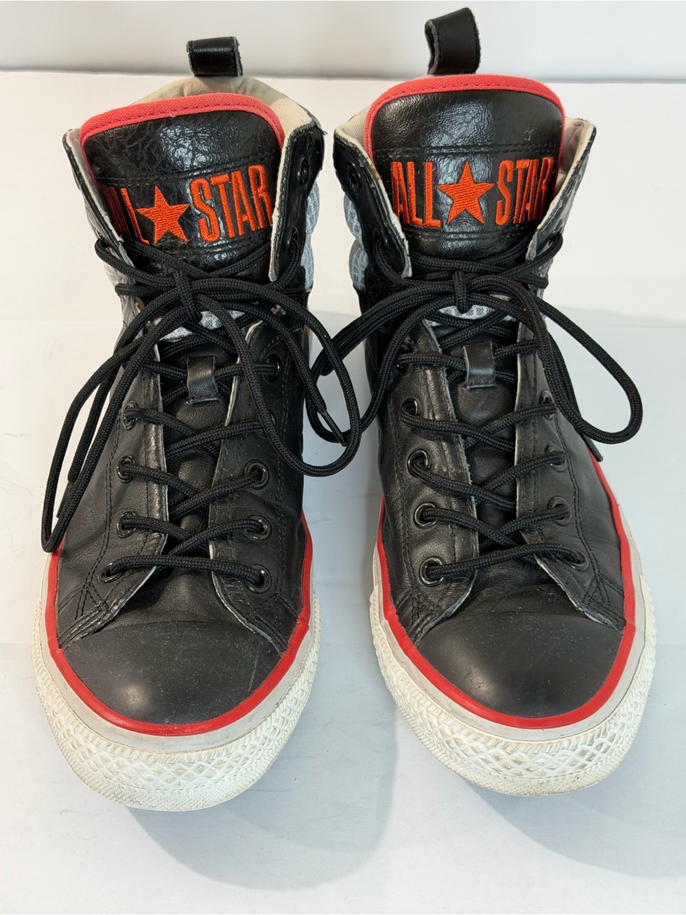 Converse Black Leather High-Top Sneakers with Red Accents